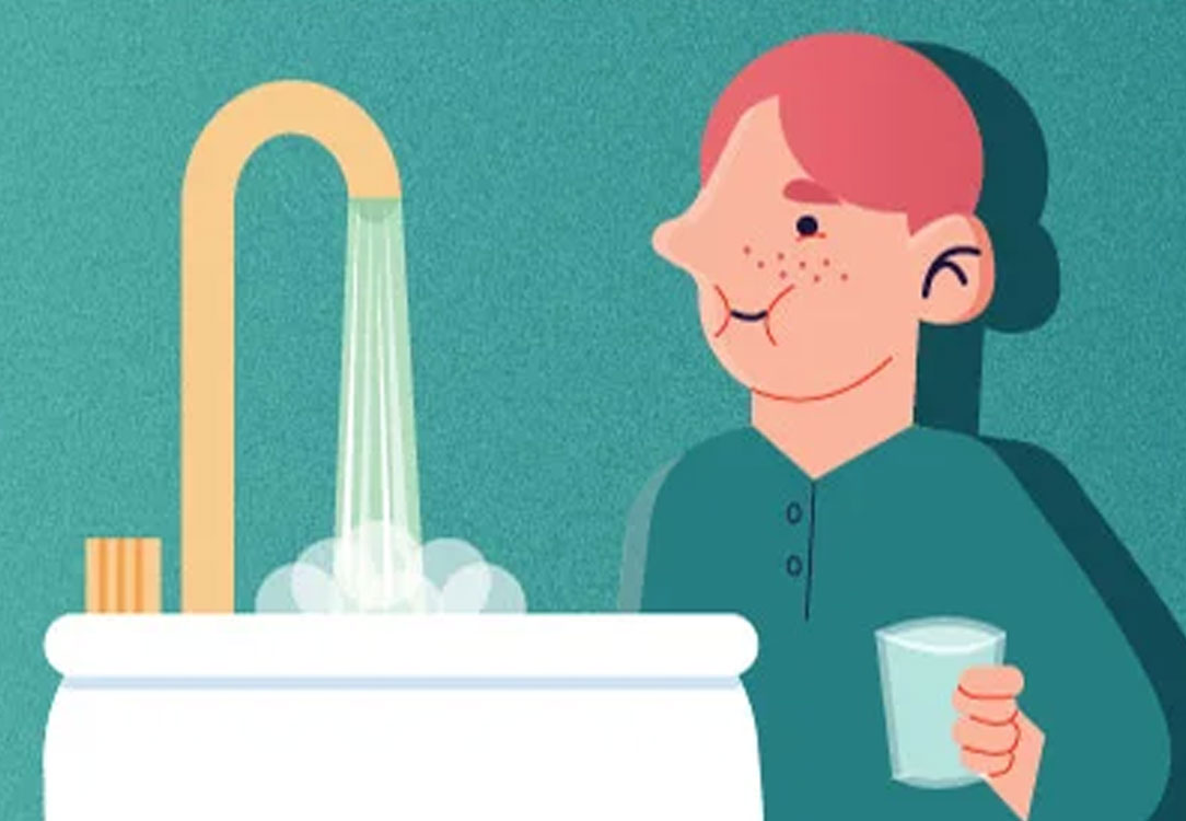 Male gargling mouthwash with the faucet running