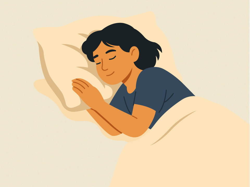 woman sleeping soundly on pillow