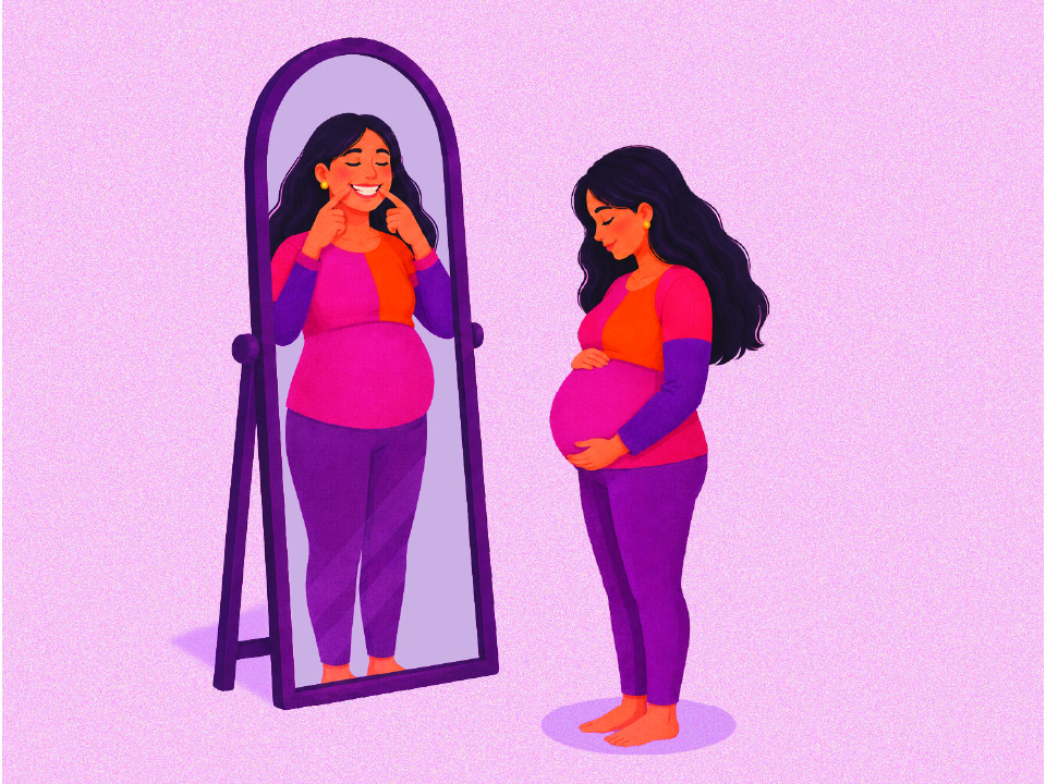 pregnant woman looking to a mirror with a smiling face